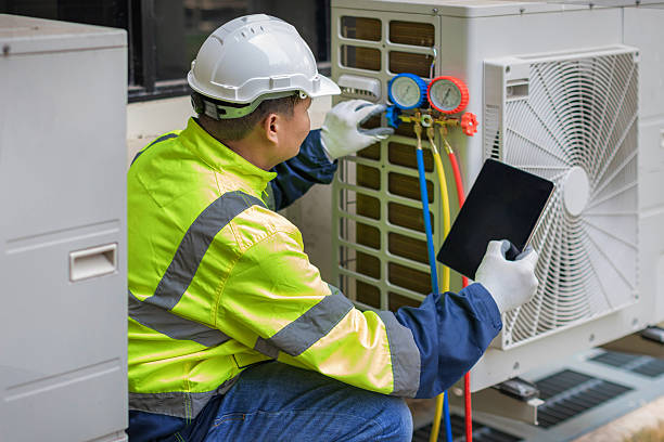 Professional Heat Pump Repair technician working in Fort Wayne, IN